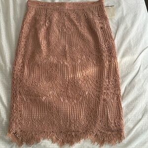 CeCe Lace Blush skirt size 2, knee length NWT.